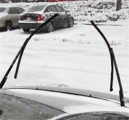WIPERS UP SO THEY WON'T FREEZE TO WINDSHIELD